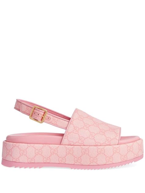 pink gucci platform sandals.